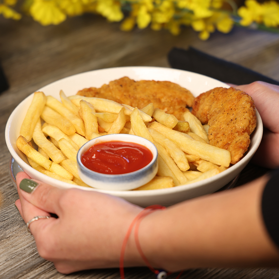 Chicken tenders with French fries.