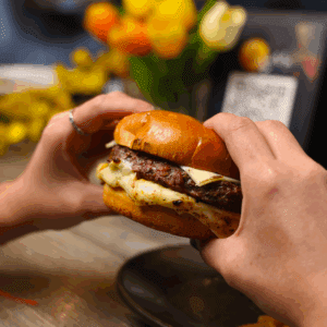 Cheeseburger with French fries.