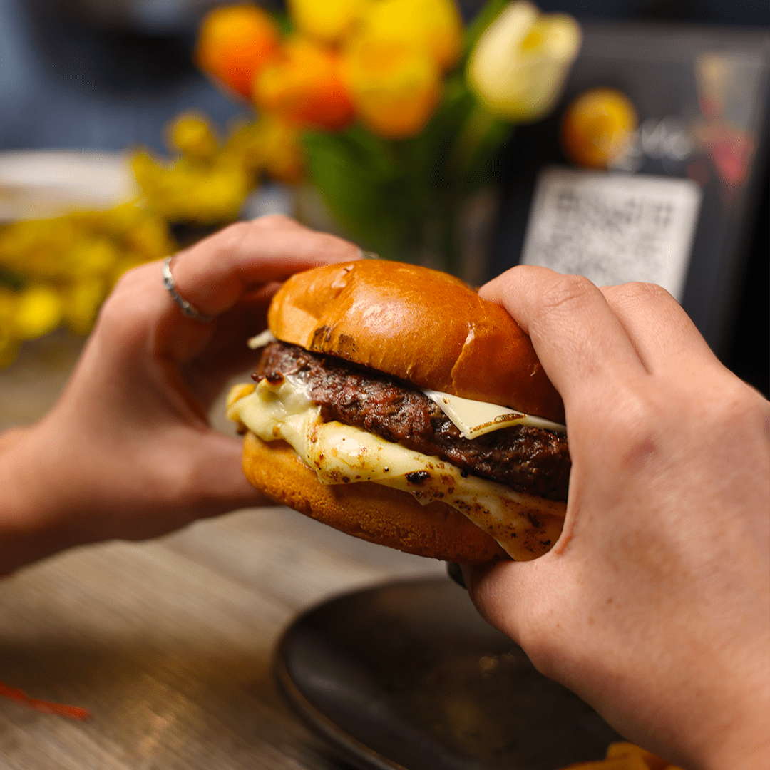 Cheeseburger with French fries.